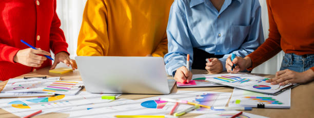 istock Startup company employee working together analyzing BI dashboard paper. Synergic 1763554321