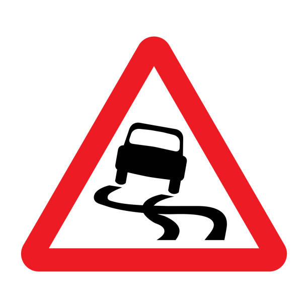 istock Slippery road traffic sign. Skid risk symbol. 1763557000