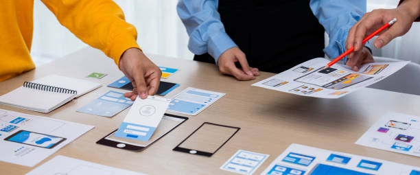 istock Panorama banner of startup company employee planning on user interface. Synergic 1763607467