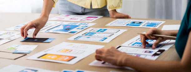 Panorama banner of startup company employee planning on user interface. Synergic