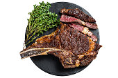 Roasted Tomahawk or cowboy with bone beef meat steak.  Isolated on white background.