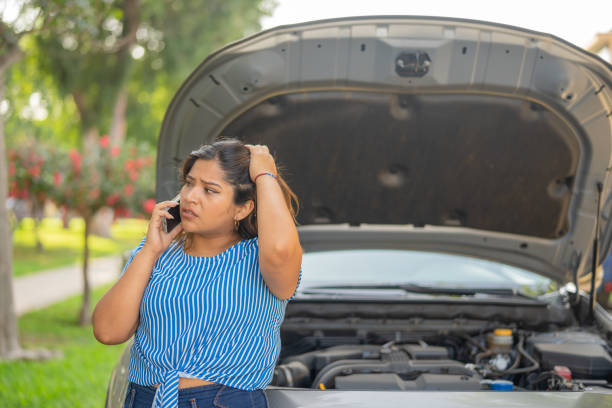 istock Woman calling insurance because her car stopped working 1763650914