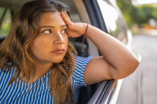 istock Woman looking out the car window 1763651611