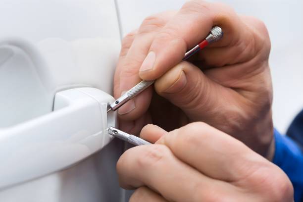 istock Hand Holding Lockpicker To Open Car Door 1763670275