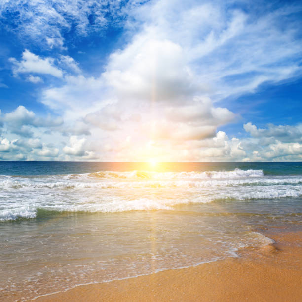 istock Tropical beach, blue sea and bright sun rise. 1763722368