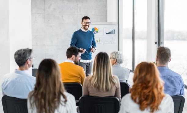 istock Business leader giving a speech on a seminar in board room. 1763775573