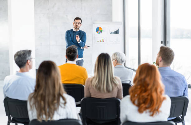 istock Business leader giving a speech on a seminar in board room. 1763776761