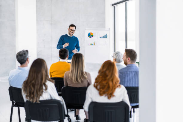 istock Business leader giving a speech on a seminar in board room. 1763777298