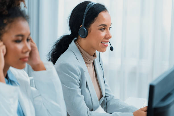 istock Business people wearing headset working in crucial office 1763825194
