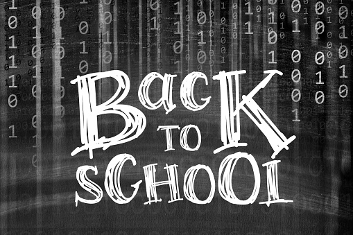 BACK TO SCHOOL lettering on a binary code background. Can illustrate the concept of online education - distance learning, distance education, e-learning, online learning.