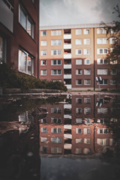 Glass Office building facade with Distorted reflections, central Berlin, Germany