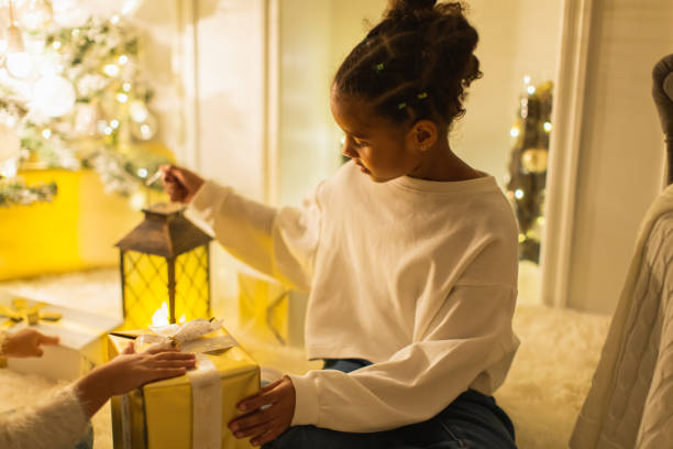 istock Girls playing with candle lantern 1763890787