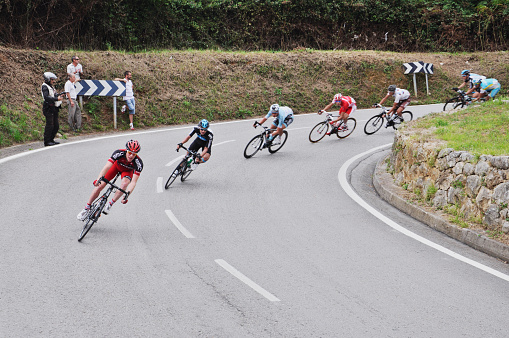 Cyclists in a Hairpin Turn at Vuelta España 2012