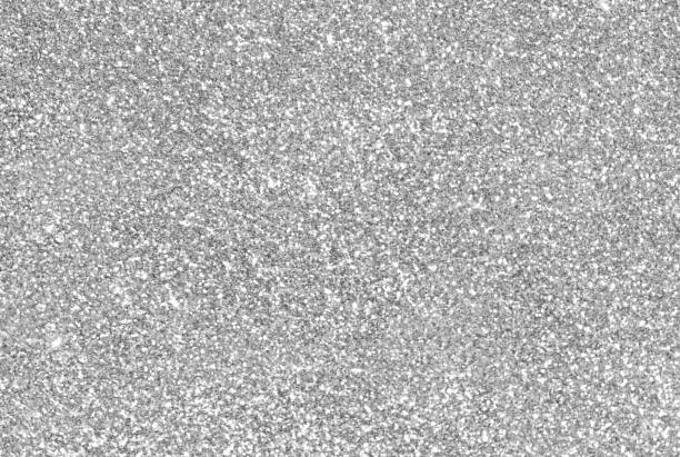 istock Gray glitter light shiny texture background. Celebration background concepts. 1763932424