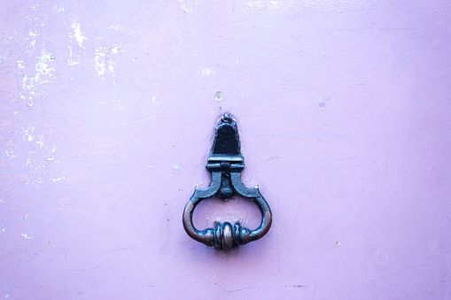 Paris, France: Antique Door Knocker on Weathered Purple Door