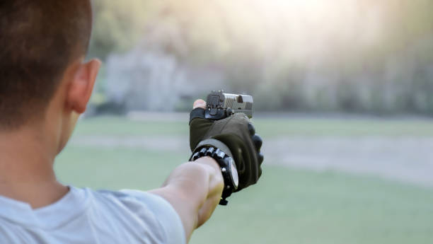 istock 9mm pistol gun and bullets 1763990745