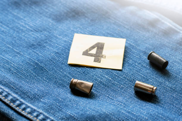 istock 9mm pistol gun and bullets 1763996008