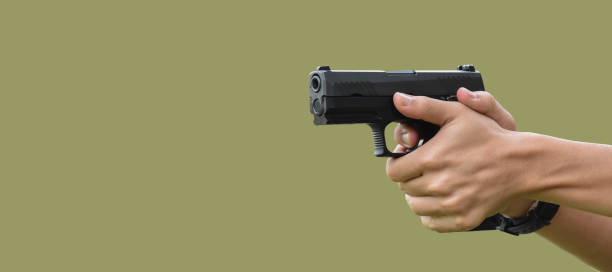 istock 9mm pistol gun and bullets 1763996050