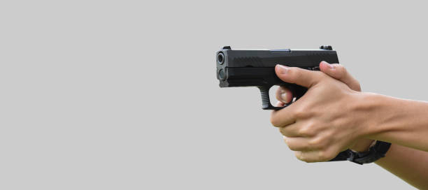 istock 9mm pistol gun and bullets 1763996360