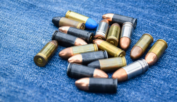 istock 9mm pistol gun and bullets 1763999368