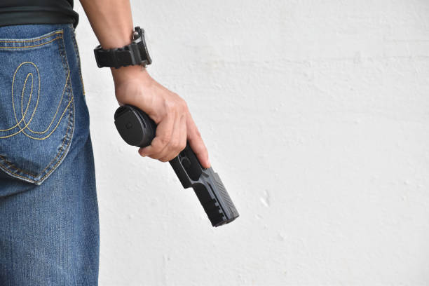 istock 9mm pistol gun and bullets 1764000554