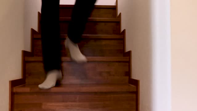 man running down the stairs