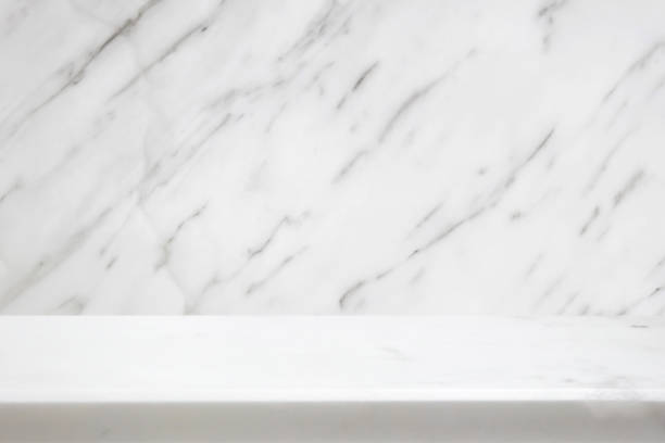 istock white marble table top with natural wall texture background for mockup product display template 1764016680