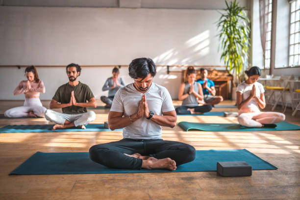 istock Indian Meditation Master and Students Focusing 1764035562