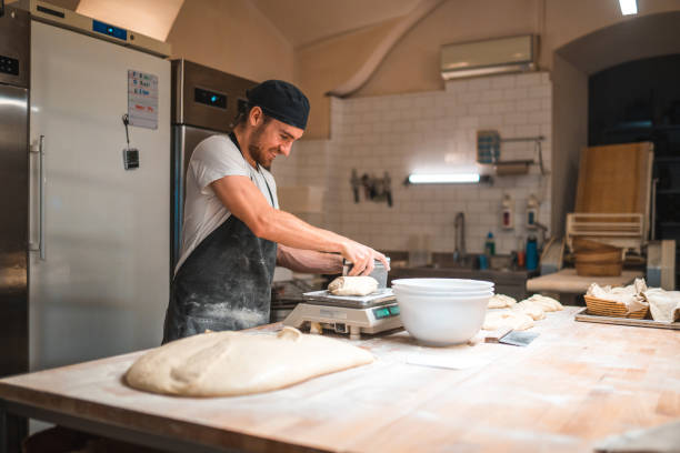 istock Proofed Dough Divided In Pieces In An Artisan Bakery 1764036088