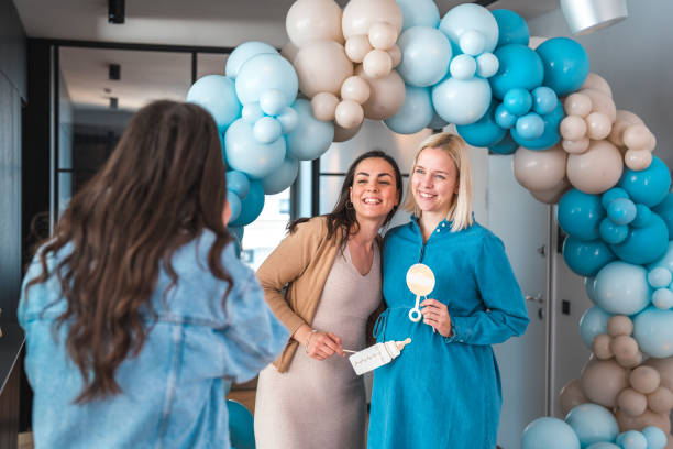 istock Capturing the Joy: A Baby Shower Moment Between Beautiful Friends 1764040640