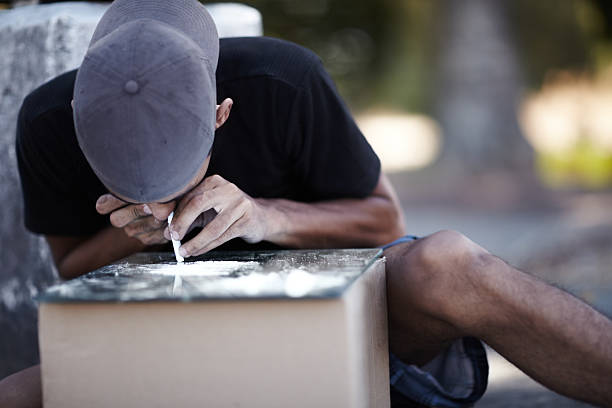 Drug addiction and gang life go hand-in-hand  snorting stock pictures, royalty-free photos & images