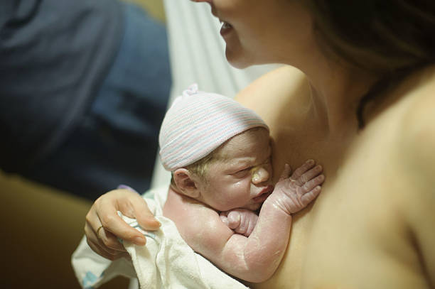 istock Newborn Boy Meeting His Mom 176407915