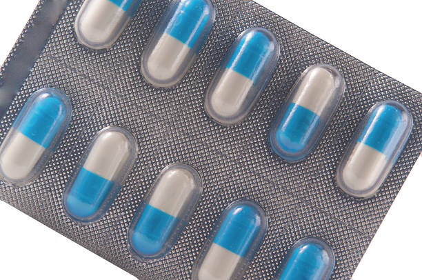 istock Blue and white capsule in transparent blister pack 176407979
