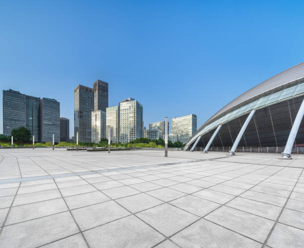 istock Panoramic skyline and modern commercial buildings with empty road. 1764113476