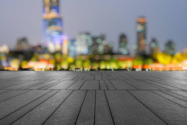 istock night view of empty brick floor front of modern building 1764116194