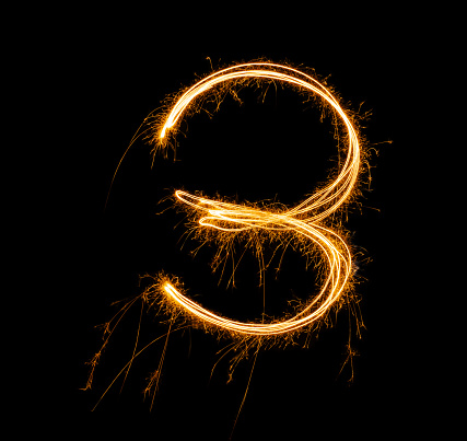 Fireworks numbers 3 Burning sparkler Numbers isolated on black background. Sparkler firework light alphabet 3 and number three. Numbers Alphabet of Sparklers