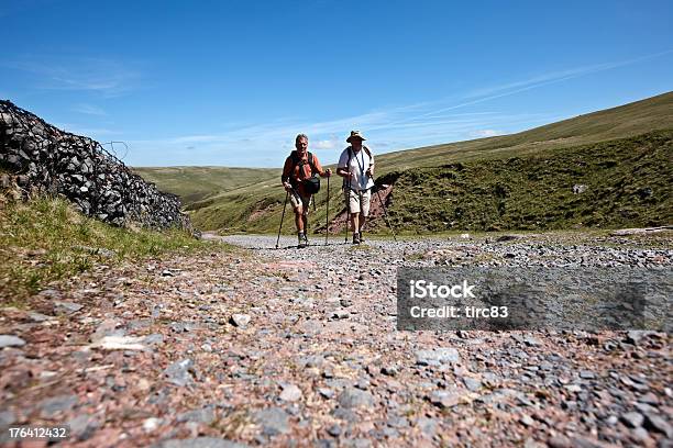 Two Mature Men Hiking In Wales Stock Photo - Download Image Now - Active Lifestyle, Active Seniors, Adult