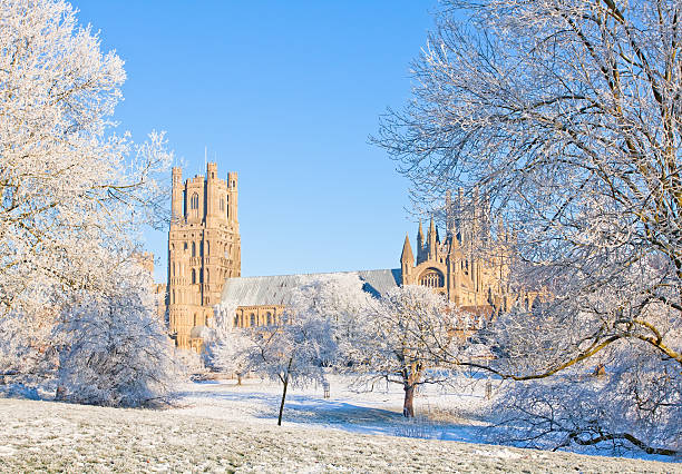 Winter view of the old cathedral in Ely Cambridgeshire Winter view of the old cathedral in Ely Cambridgeshire ely england photos stock pictures, royalty-free photos & images