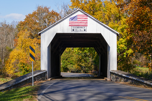 Photo of the Erwinna Covered Bridge in autumn taken in Tinicum Township, Bucks County, Pennsylvania, USA