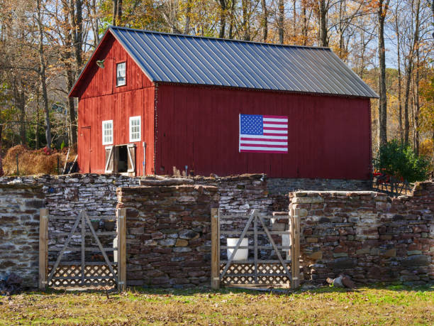 istock Red Barn and American Flag 1764152743