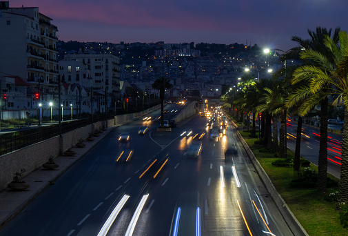 Highway in Algiers, Alger, Algeria by night. Long exposure with rays of light coming from the vehicles.