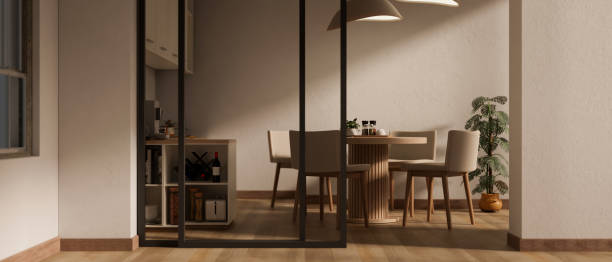 diseño interior de un comedor escandinavo minimalista con una mesa de comedor y una puerta corredera. - sliding door hardwood floor dining room floor fotografías e imágenes de stock