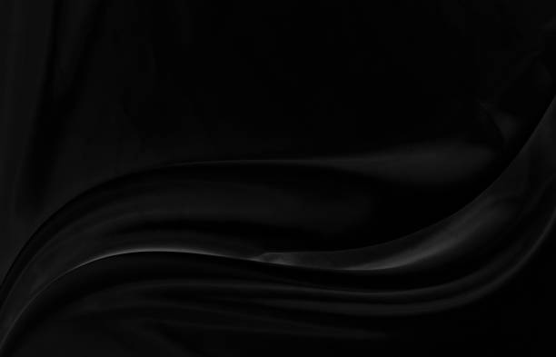 istock Black gray satin dark fabric texture luxurious shiny that is abstract silk cloth background with patterns soft waves blur beautiful. 1764193806
