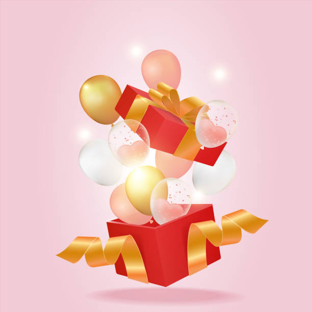 istock A gift tied with a gold ribbon and many balloons fly out after opening 1764194867