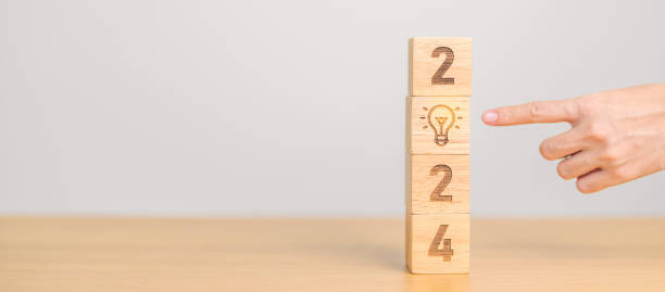 istock 2024 block with lightbulb. Business Idea, Creative, Thinking, brainstorm, Goal, Resolution, strategy, plan, Action, change and New Year start concepts 1764219138