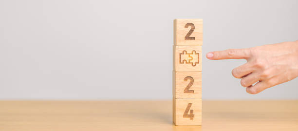 istock 2024 block with jigsaw puzzle icon. Business Process, Team, teamwork, Goal, mission, Resolution, strategy, plan, Action, partnership, and New Year start 1764219571