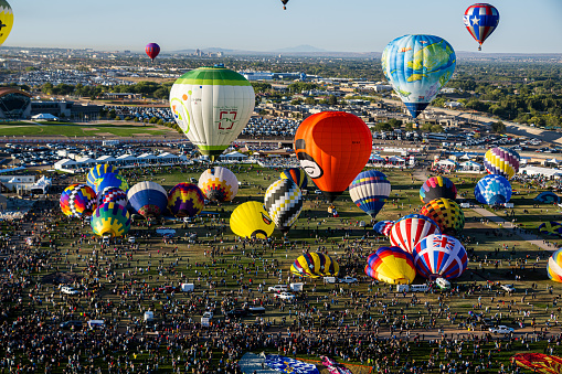 Albuquerque, New Mexico - USA - Oct 8, 2023: Several hot air balloons preparing to launch at the Albuquerque International Balloon Fiesta