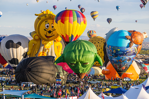 Albuquerque, New Mexico - USA - Oct 10, 2023: Several hot air balloons launch at the Albuquerque International Balloon Fiesta