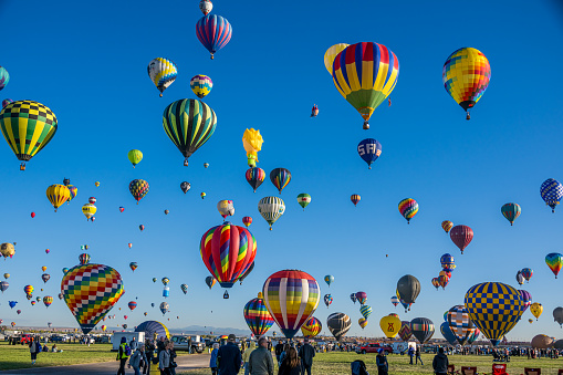 Albuquerque, New Mexico - USA - Oct 11, 2023: Several hot air balloons launch at the Albuquerque International Balloon Fiesta