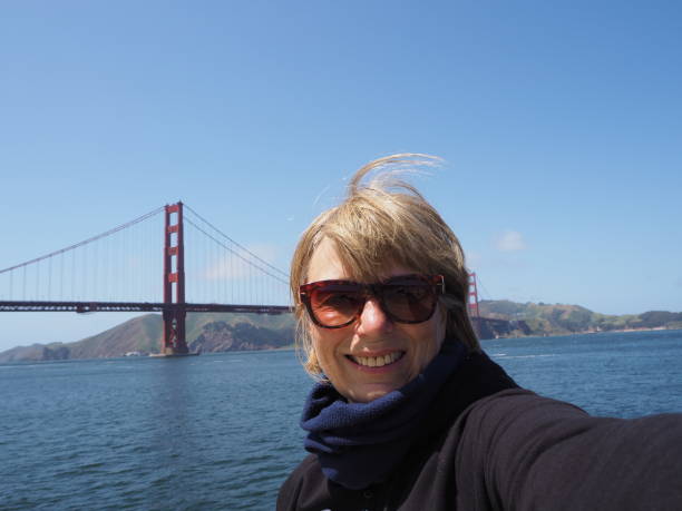 istock Woman making Selfie with Golden Gate Bridge 1764236218
